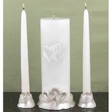 Unity candle flanked by two smaller candles