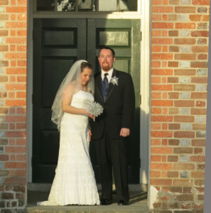 Happy couple after wedding in front of the Hanover County Courthouse