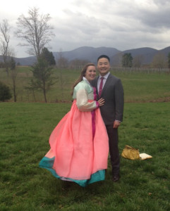 The happy couple poses for pictures after the Korean wedding rituals have been performed