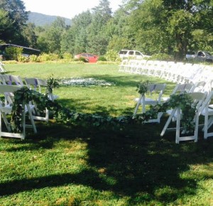 Forgive the bad lighting, but hopefully you can see the chairs, in process of being set up for the big day!